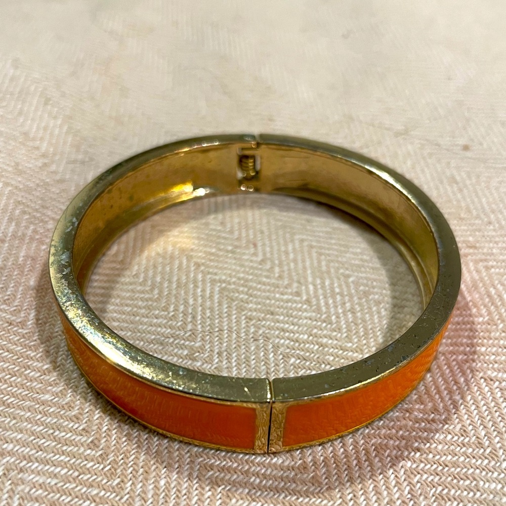 JCrew orange enamel and gold bangle.